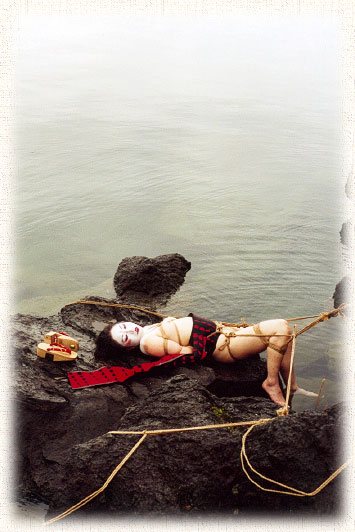 Photo of Satako in bondage